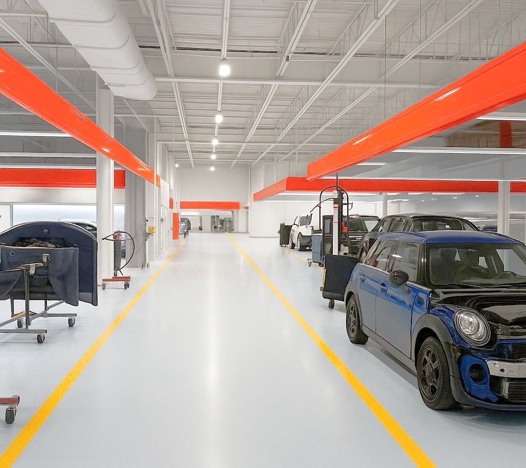 Body-Shop-with-cars-being-worked-on-TopShop-Collision-Group-DRP-program